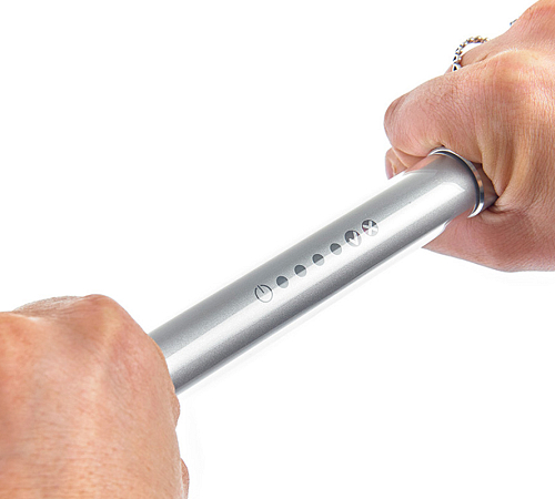 An image of a person holding the MyDiagnostick AF screening device